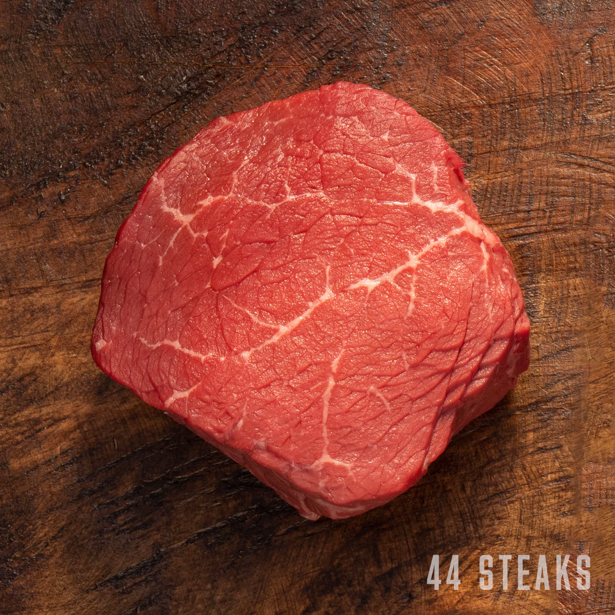 usda choice top sirloin steak on wooden cutting board