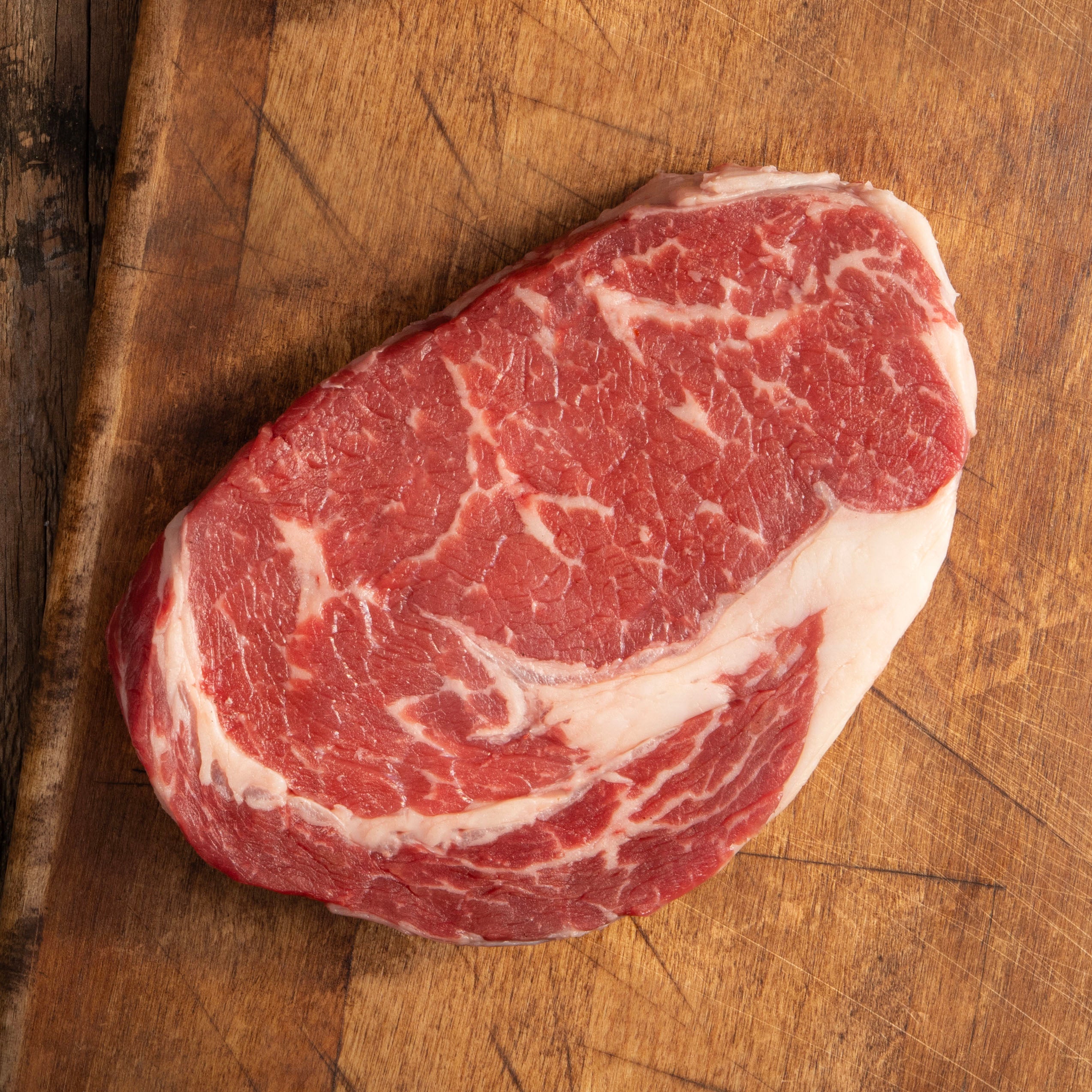 USDA Choice Black Angus Boneless Ribeye Steak from 44 Farms with abundant marbling, ideal for grilling, reverse searing, and cast iron cooking