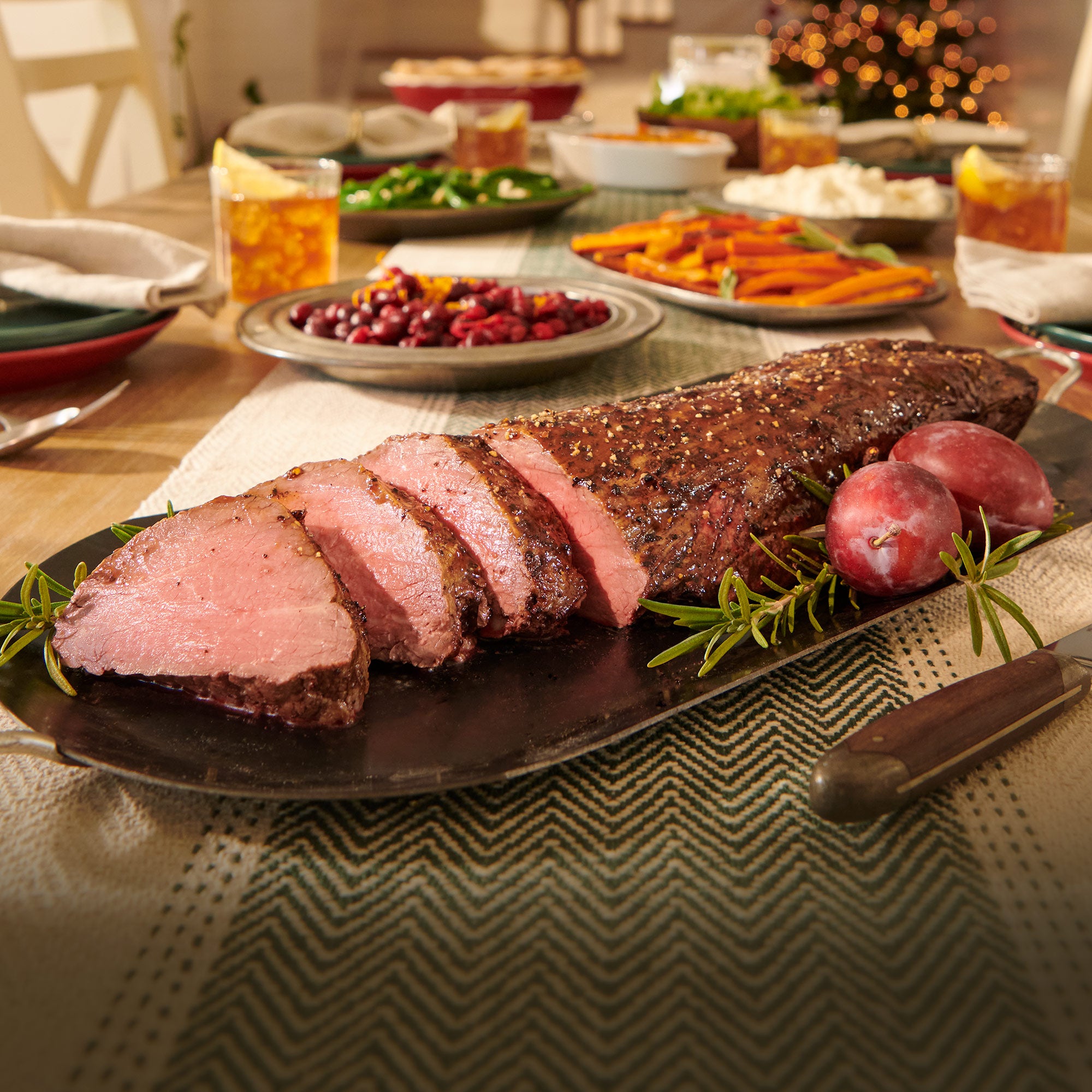 Fully cooked USDA Choice Black Angus smoked beef tenderloin from 44 Farms, hickory smoked and sliced for a holiday dinner centerpiece